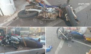 Motociclista foi socorrido por brigadistas após cair no cruzamento da Avenida Queiroz Júnior com a rua Pio XIII; ônibus envolvido deixou o local antes da chegada das autoridades. Foto — Guarda Civil Municipal de Itabirito.