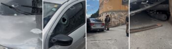 Moto Titan colidiu com carro após troca de tiros; barbearia e veículo de morador foram atingidos. Polícia investiga ligação com tráfico de drogas. Fotos — Agito Mais.